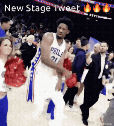 A Basketball Player In A Philadelphia Jersey Is Dancing On The Court GIF