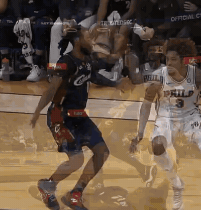 A Basketball Player In A Philadelphia Jersey Is Dribbling The Ball GIF