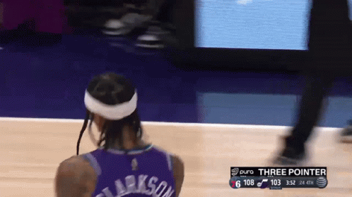 A Basketball Player In A Purple Jersey With Clarkson Written On The Back GIF