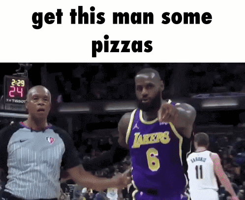 A Basketball Player In A Purple Lakers Jersey Shakes Hands With A Referee GIF