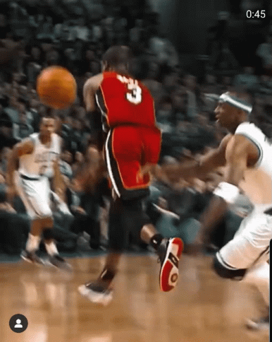 A Basketball Player In A Red Jersey With The Number 3 On It GIF