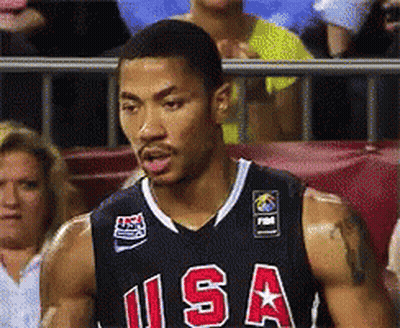 A Basketball Player In A Usa Jersey Stands In Front Of A Crowd GIF