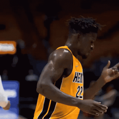 A Basketball Player In A Yellow Jersey With The Number 22 On It GIF