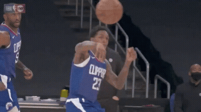A Basketball Player In A Yellow Jersey With The Number 8 On It GIF