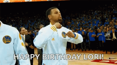 A Basketball Player Is Celebrating His Birthday On A Basketball Court While A Crowd Watches . GIF