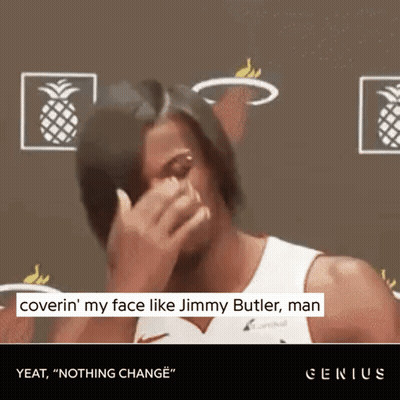 A Basketball Player Is Covering His Face With His Hand And Says " Coverin ' My Face Like Jimmy Butler Man Yeat " GIF