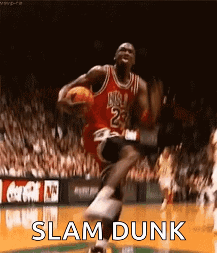 A Basketball Player Is Jumping In The Air While Holding A Basketball In His Hand . GIF