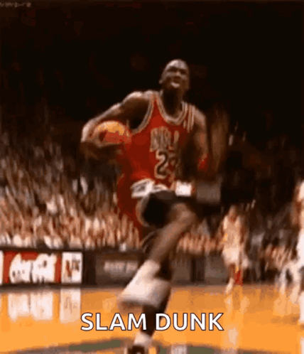 A Basketball Player Is Jumping In The Air With A Basketball In His Hand . GIF