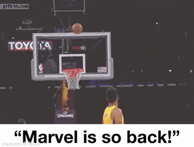 A Basketball Player Is Jumping In The Air With His Arms Outstretched And The Words `` Marvel Is So Back '' . GIF