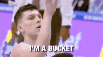 A Basketball Player Is Saying I 'M A Bucket While Holding A Basketball . GIF