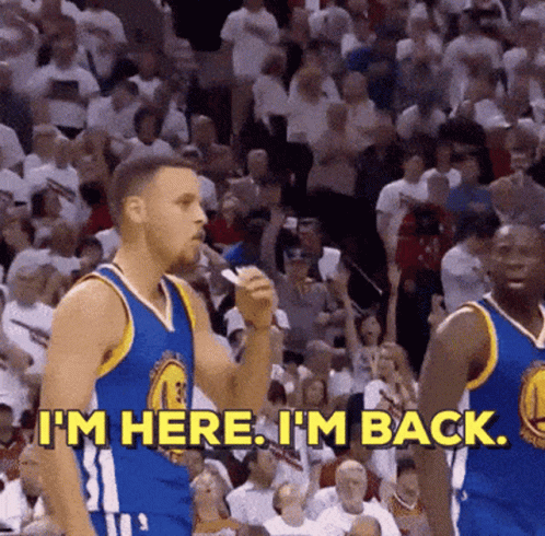 A Basketball Player Is Standing In Front Of A Crowd And Says I 'M Here I 'M Back GIF