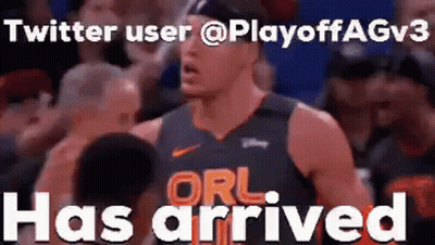 A Basketball Player Is Standing In Front Of A Crowd With The Words Twitter User @Playoffagv3 Has Arrived . GIF