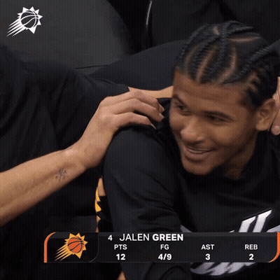 A Basketball Player Named Jalen Green Is Hugging Another Player During A Game GIF