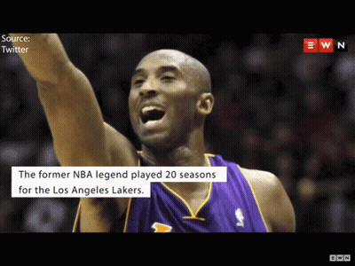 A Basketball Player Named Kobe Bryant Is Celebrating With His Arms In The Air GIF