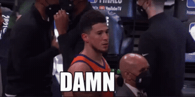 A Basketball Player Standing In A Locker Room With The Word Damn Written On The Screen GIF