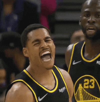 A Basketball Player Wearing A Black And Yellow Jersey With The Number 23 On It . GIF