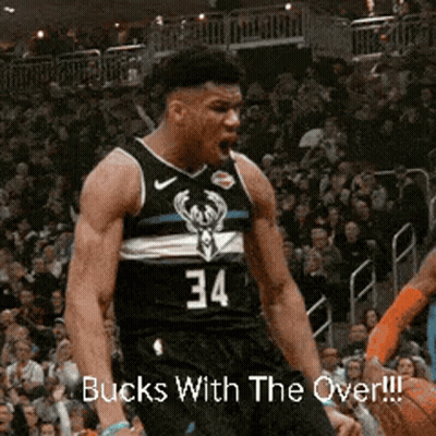 A Basketball Player Wearing A Black Jersey With The Number 34 On It GIF