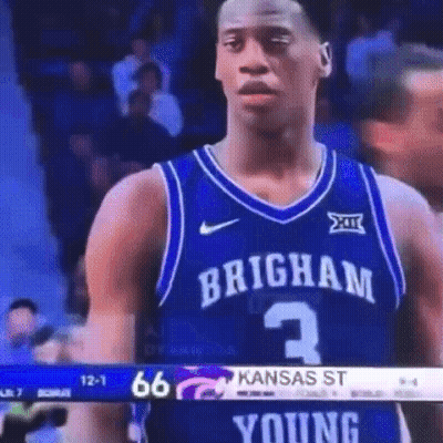 A Basketball Player Wearing A Blue Jersey That Says Brigham 3 On It GIF