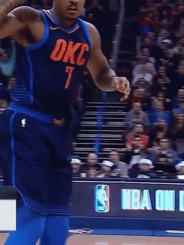 A Basketball Player Wearing A Blue Okc Jersey GIF