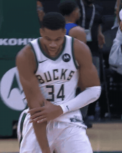 A Basketball Player Wearing A Bucks Jersey Number 34 GIF
