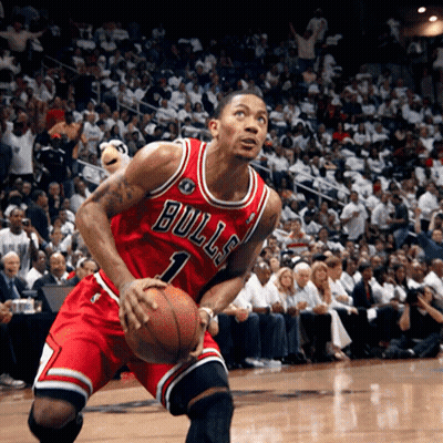 A Basketball Player Wearing A Bulls Jersey Holds A Basketball GIF
