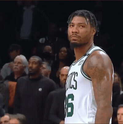 A Basketball Player Wearing A Celtics Jersey With The Number 6 On It GIF