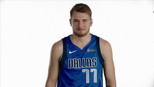 A Basketball Player Wearing A Dallas 77 Jersey GIF