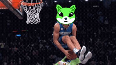 A Basketball Player Wearing A Dallas Jersey Is Dunking A Ball GIF