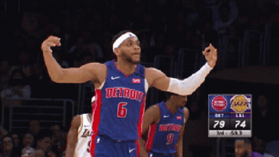 A Basketball Player Wearing A Detroit Jersey Stands On The Court GIF