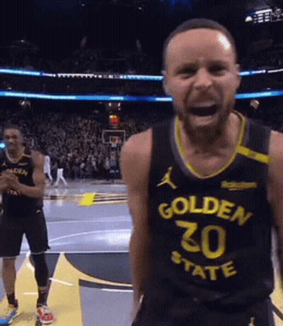 A Basketball Player Wearing A Golden State 30 Jersey Stands On The Court GIF
