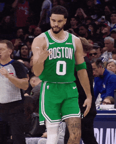 A Basketball Player Wearing A Green Jersey With Boston 0 On It GIF