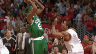 A Basketball Player Wearing A Green Jersey With The Number 8 On It GIF