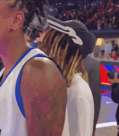 A Basketball Player Wearing A Hat With A Key On It GIF