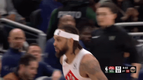 A Basketball Player Wearing A Headband That Says I On It GIF