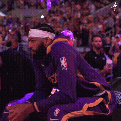 A Basketball Player Wearing A Headband That Says La On It GIF