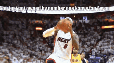 A Basketball Player Wearing A Heat Jersey Holds A Basketball GIF