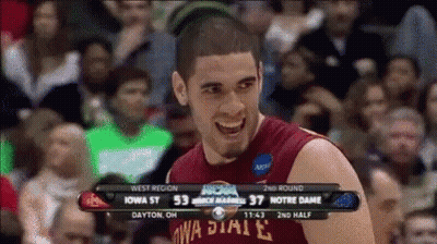 A Basketball Player Wearing A Iowa State Jersey Is Smiling In Front Of A Crowd GIF