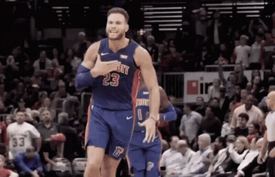 A Basketball Player Wearing A Jersey That Says 23 GIF