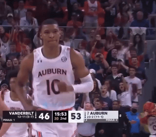 A Basketball Player Wearing A Jersey That Says Auburn 10 GIF
