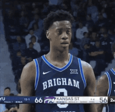 A Basketball Player Wearing A Jersey That Says Brigham 2 GIF