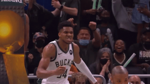 A Basketball Player Wearing A Jersey That Says Bucks GIF
