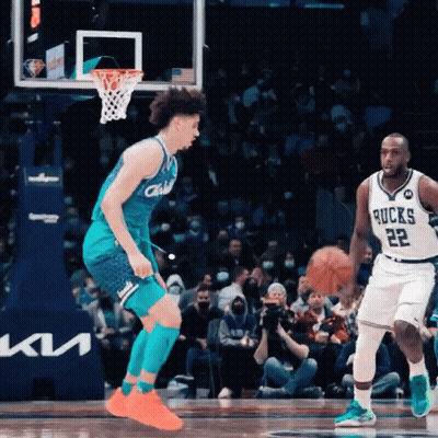 A Basketball Player Wearing A Jersey That Says Bucks On It GIF