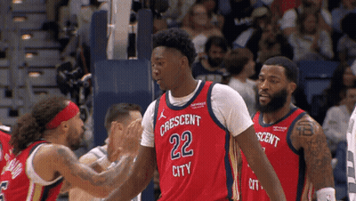 A Basketball Player Wearing A Jersey That Says Crescent City GIF