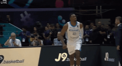 A Basketball Player Wearing A Jersey That Says Eaas On It GIF