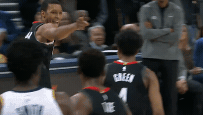 A Basketball Player Wearing A Jersey That Says Green GIF