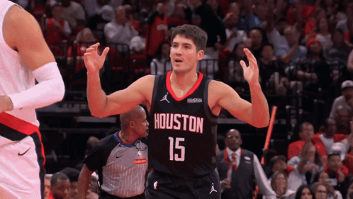 A Basketball Player Wearing A Jersey That Says Houston 15 On It GIF