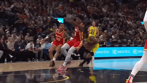 A Basketball Player Wearing A Jersey That Says Jazz GIF