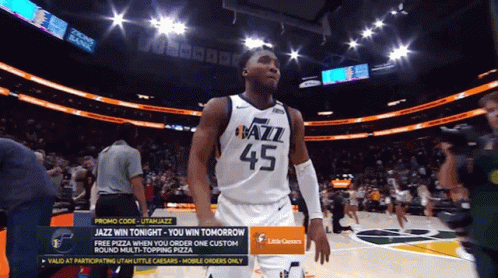 A Basketball Player Wearing A Jersey That Says Jazz On It GIF