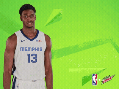 A Basketball Player Wearing A Jersey That Says Memphis 13 On It GIF