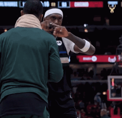 A Basketball Player Wearing A Jersey That Says Motorola GIF